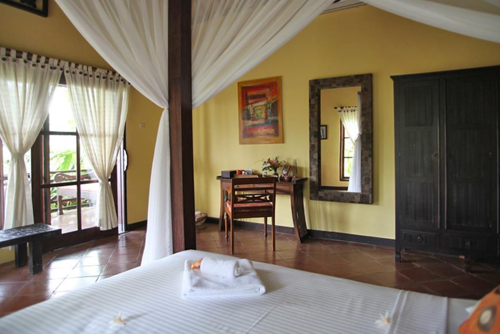 Puri Mangga Sea View Resort And Spa Ловина Номер фото