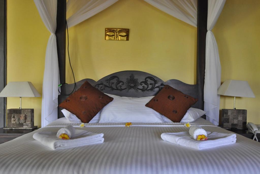 Puri Mangga Sea View Resort And Spa Ловина Номер фото